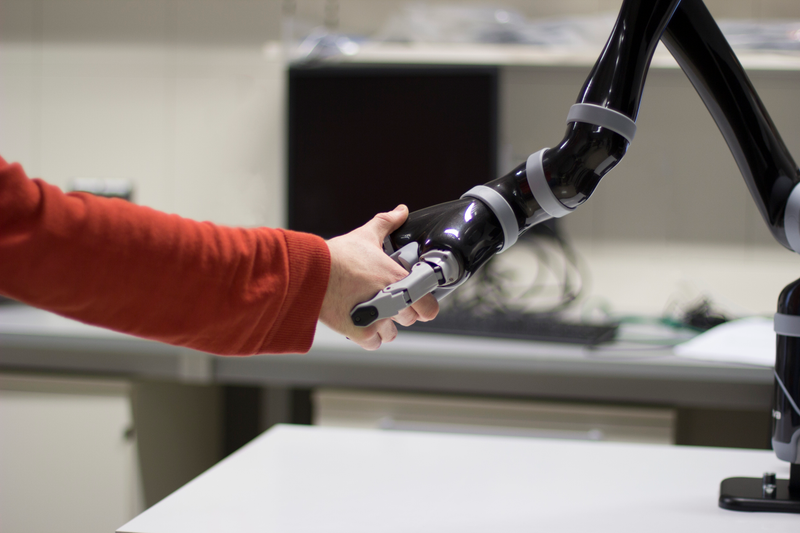 Time to shake hands with the future: Brain-controlled robots like the one above are starting to enter everyday life. (Image: Wyss Center)
